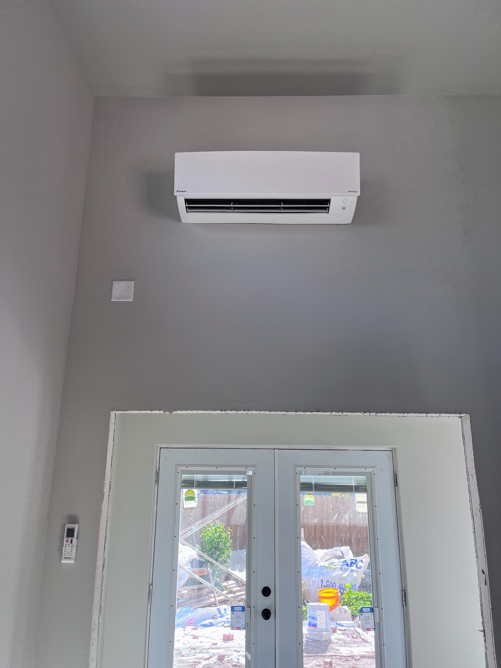 Daikin heat pump install in a residential garage